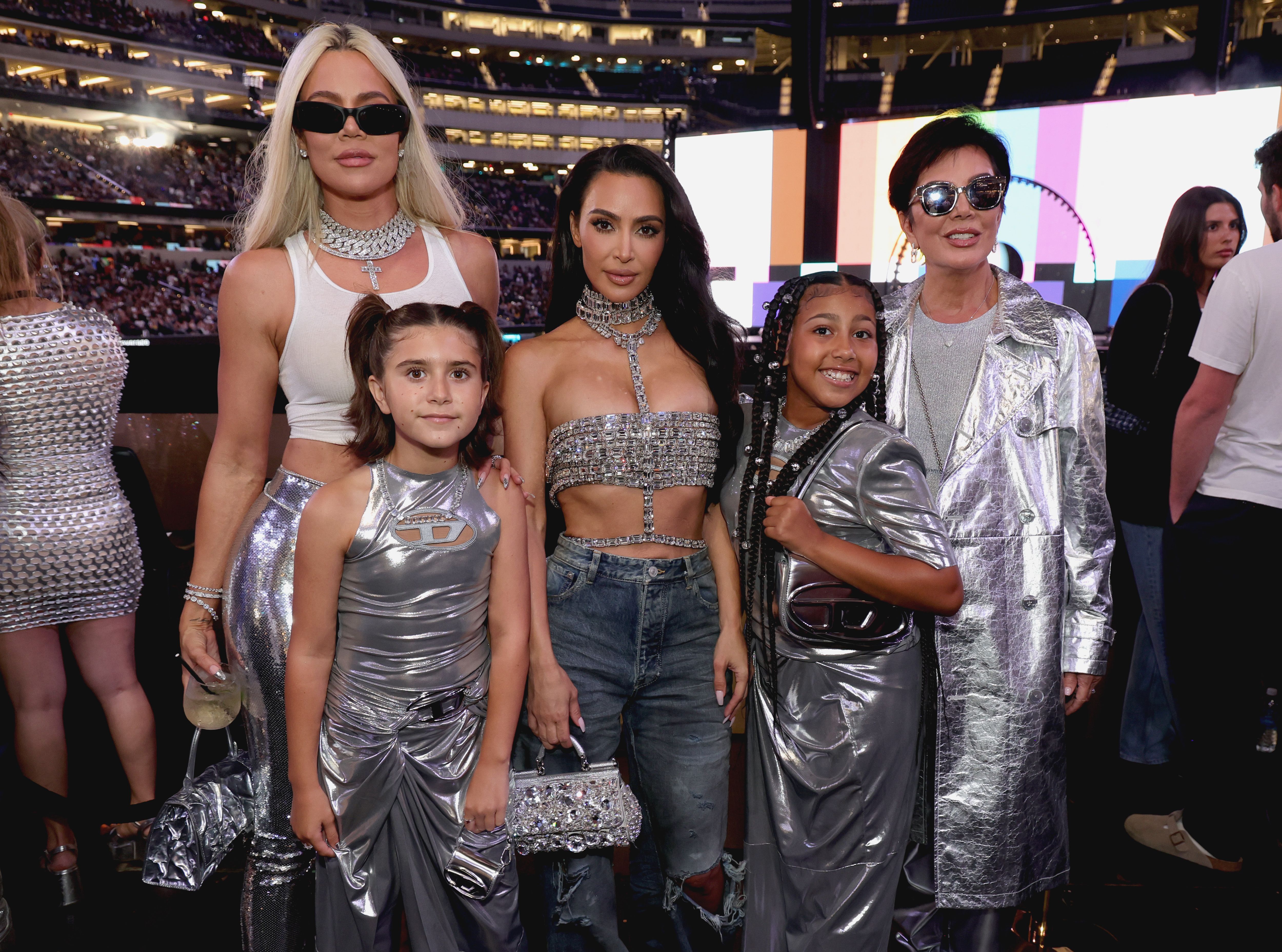 Penelope Disick, 11, second left, and North West, 10, second from right, with her mother Kim Kardashian, centre, Khloé Kardashian and Kris Jenner