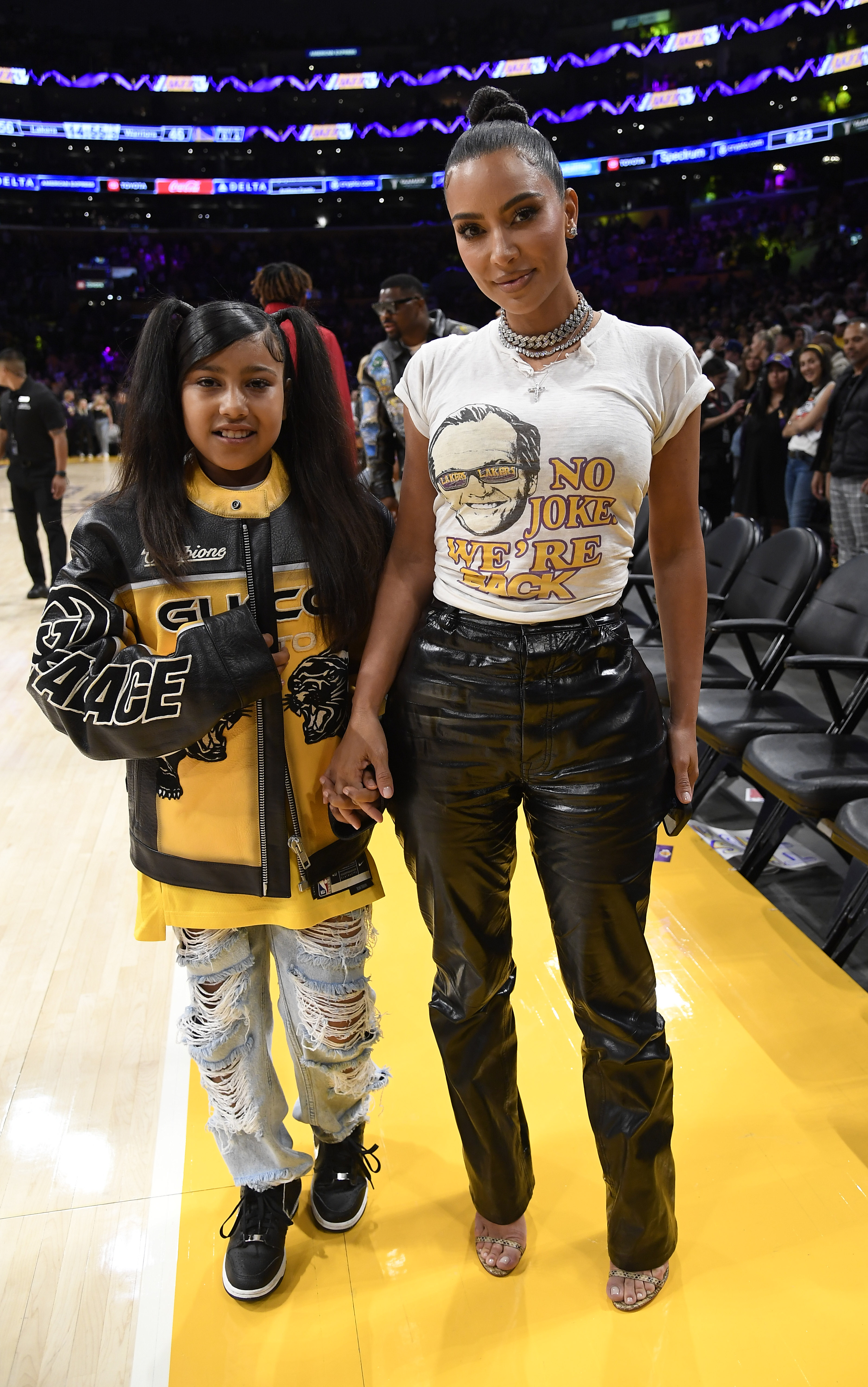 North West at an NBA game last year with mother Kim Kardashian